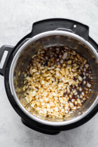 cooking onions and garlic in Instant Pot.