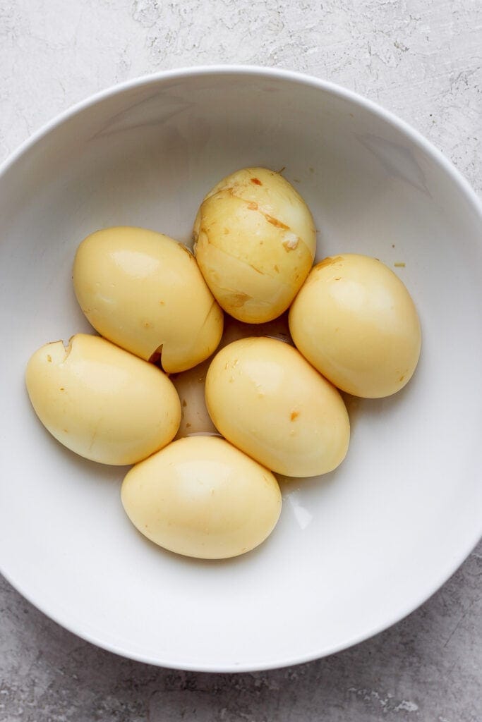 Marinated ramen eggs on a plate. 