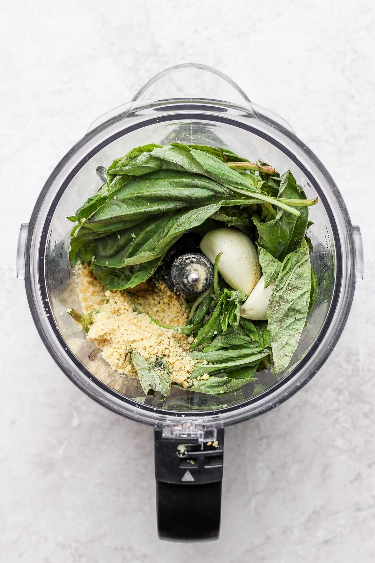 pesto ingredients in food processor