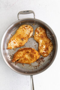 pan frying chicken.