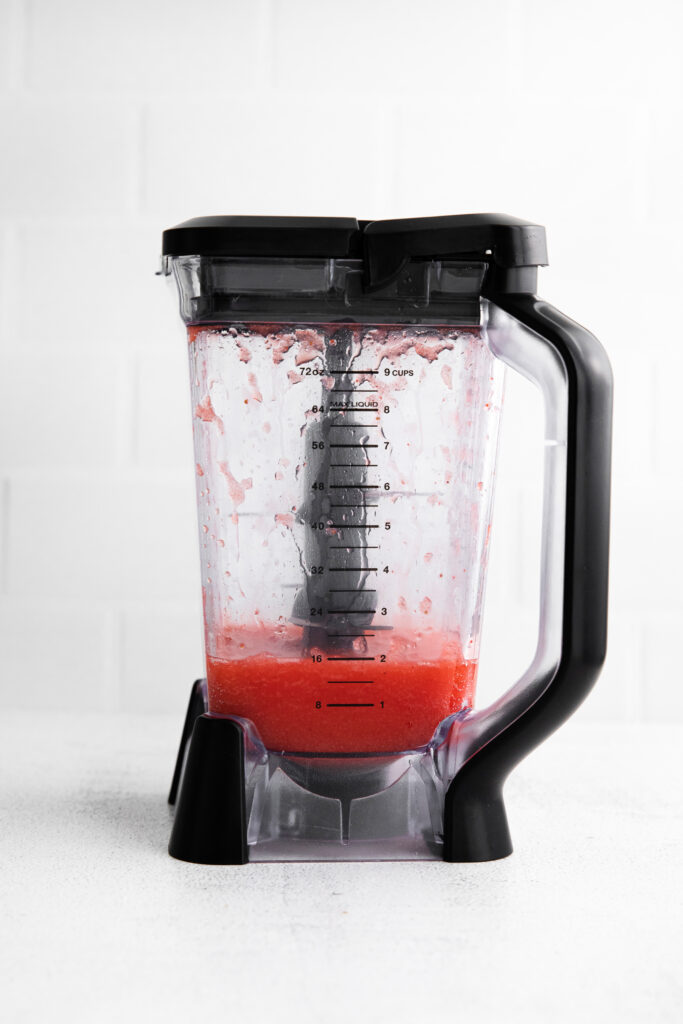 blended strawberry margarita in blender