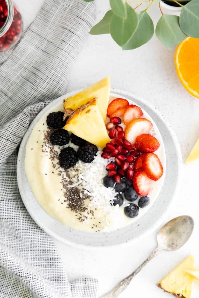 pineapple smoothie bowl with berries on top