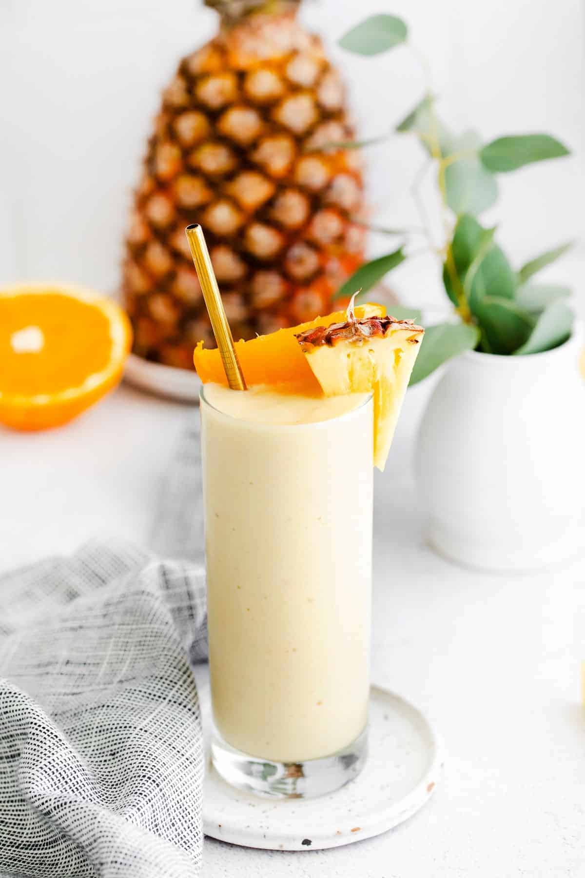 pineapple smoothie with orange and pineapple chunks