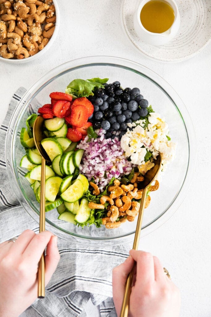 Spring mix salad ingredients in a bowl. 