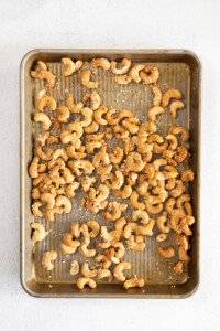 cashews on baking sheet.