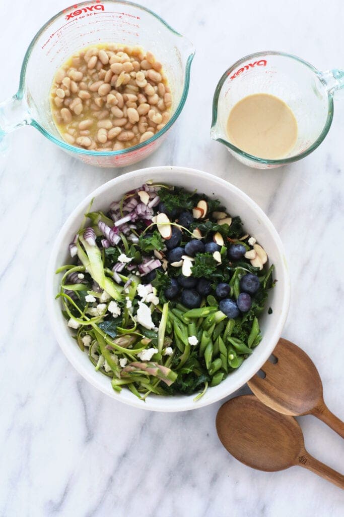 All of the ingredients for the asparagus salad laid out on the counter. 