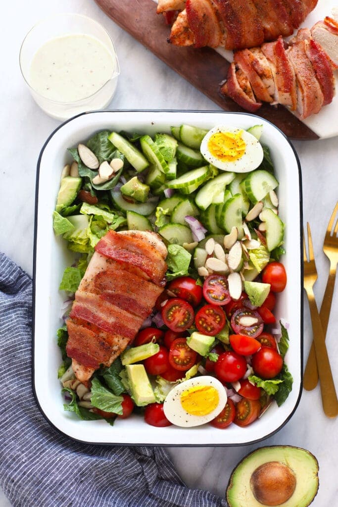 chicken salad in dish with 2 forks