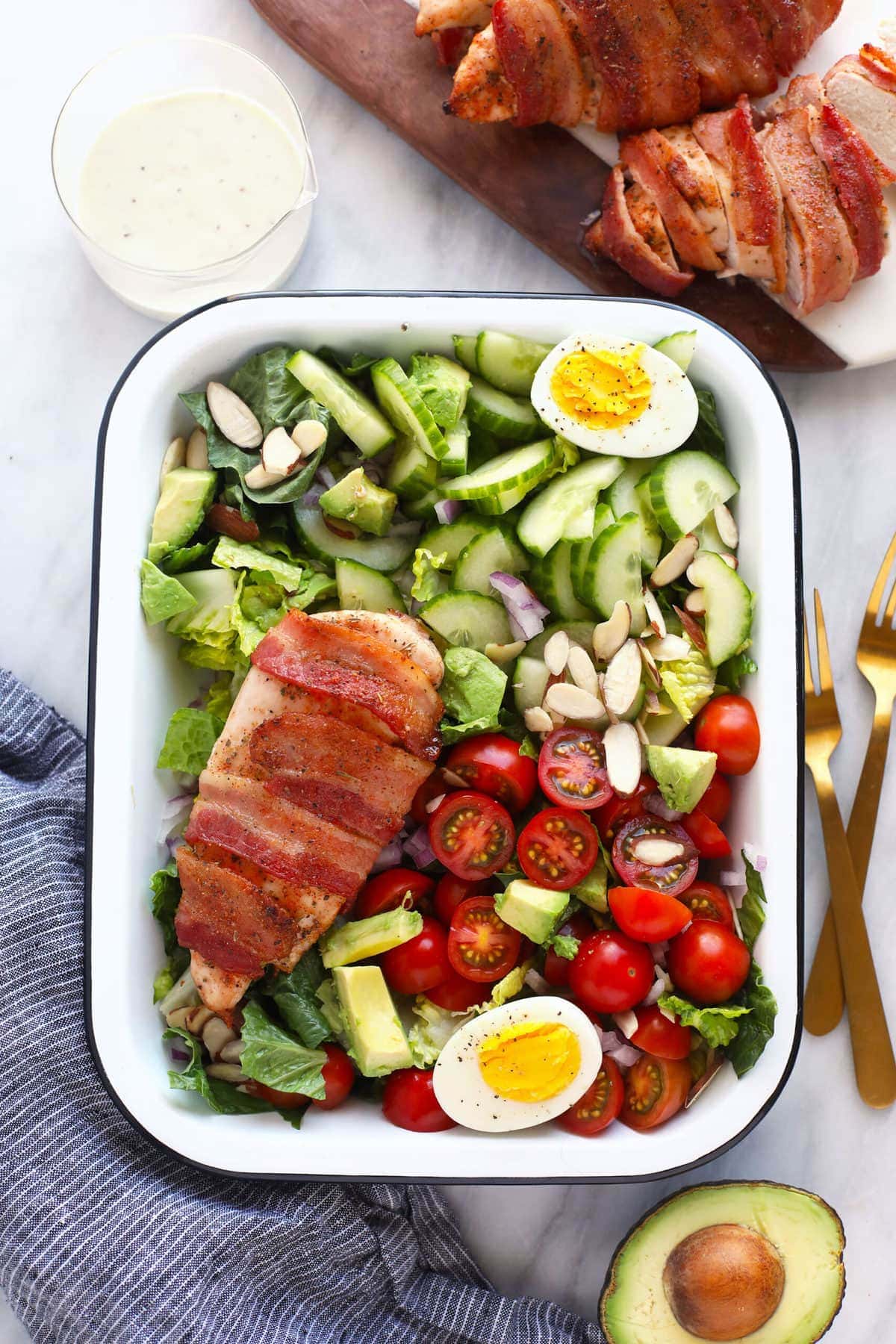 chicken salad in dish with 2 forks