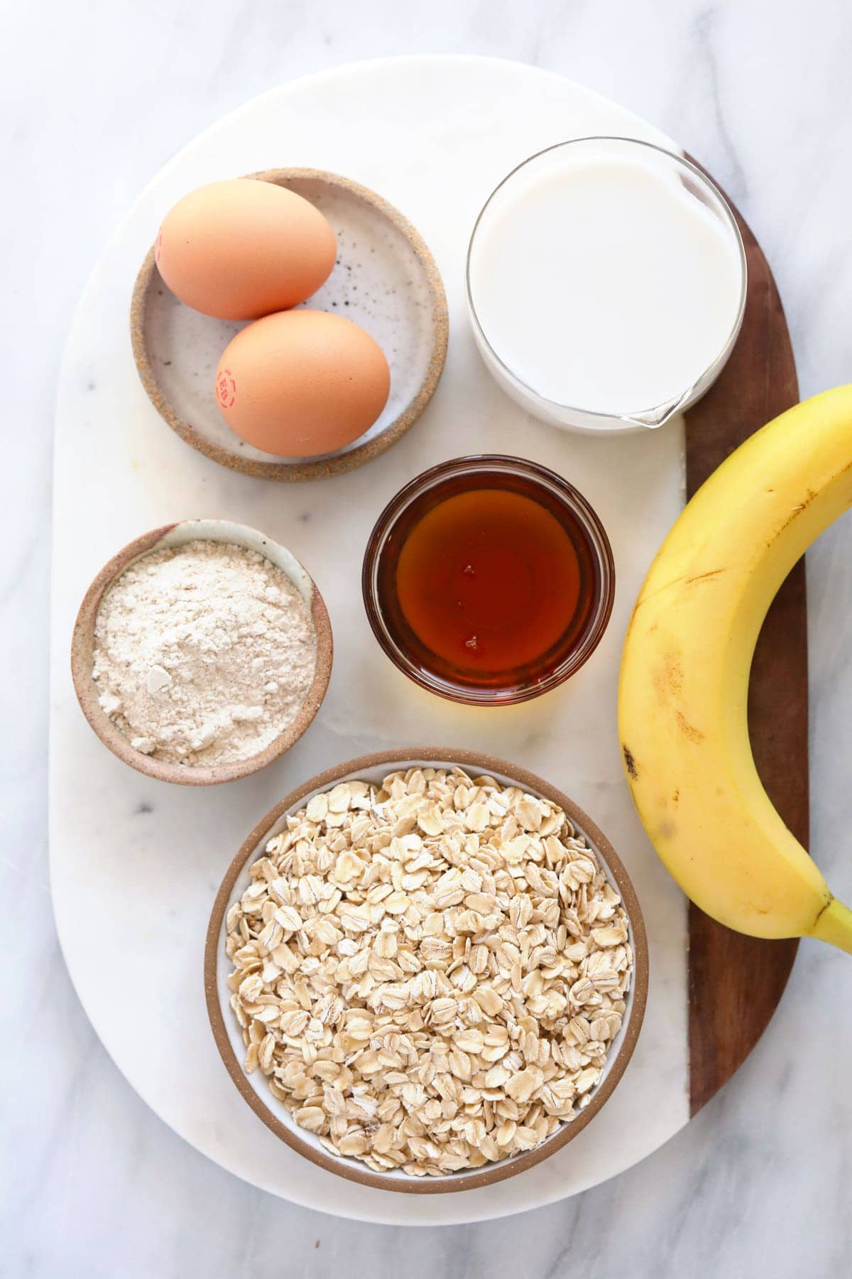 oatmeal, eggs, flour, banana, milk, and maple syrup