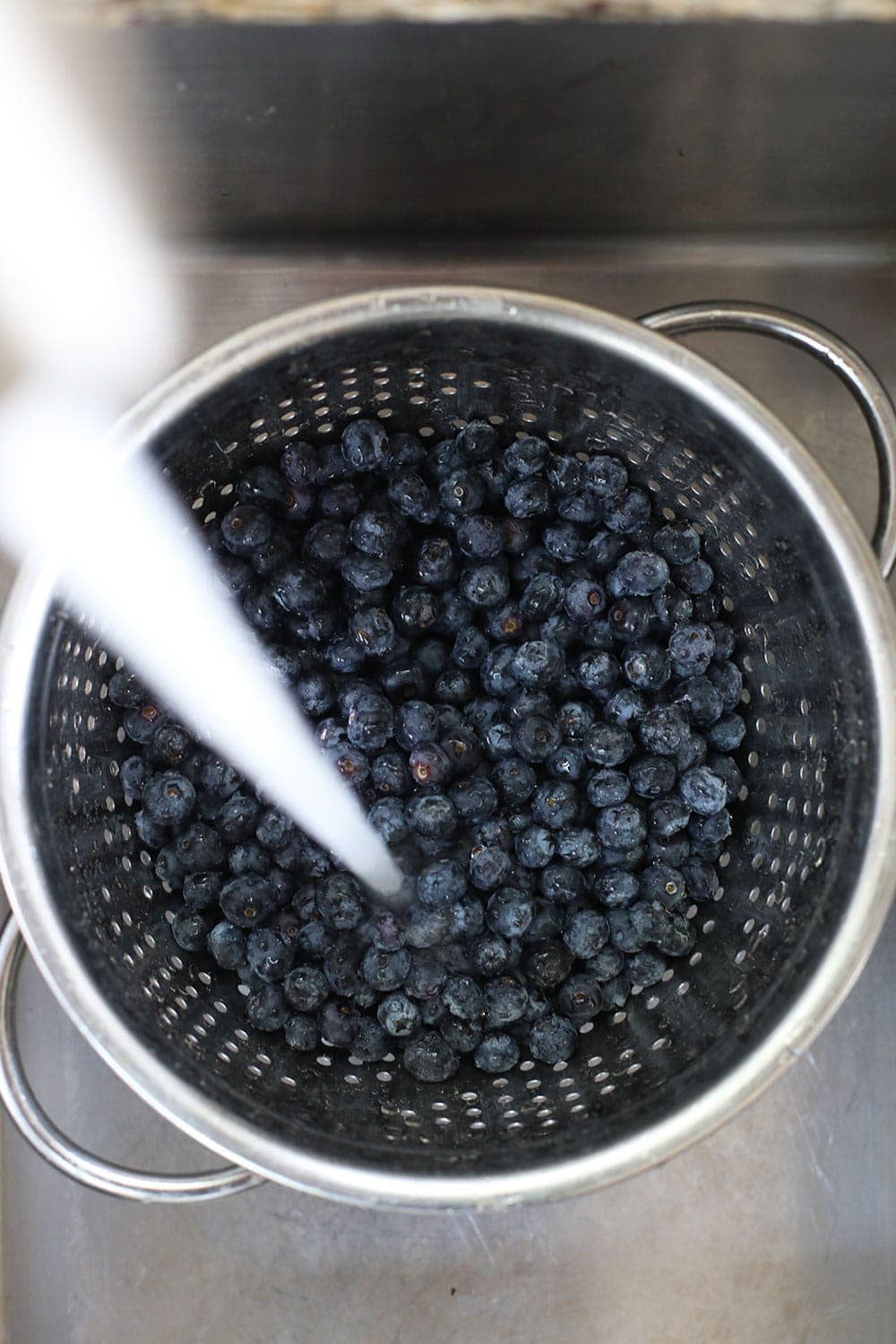 blueberries in strainer