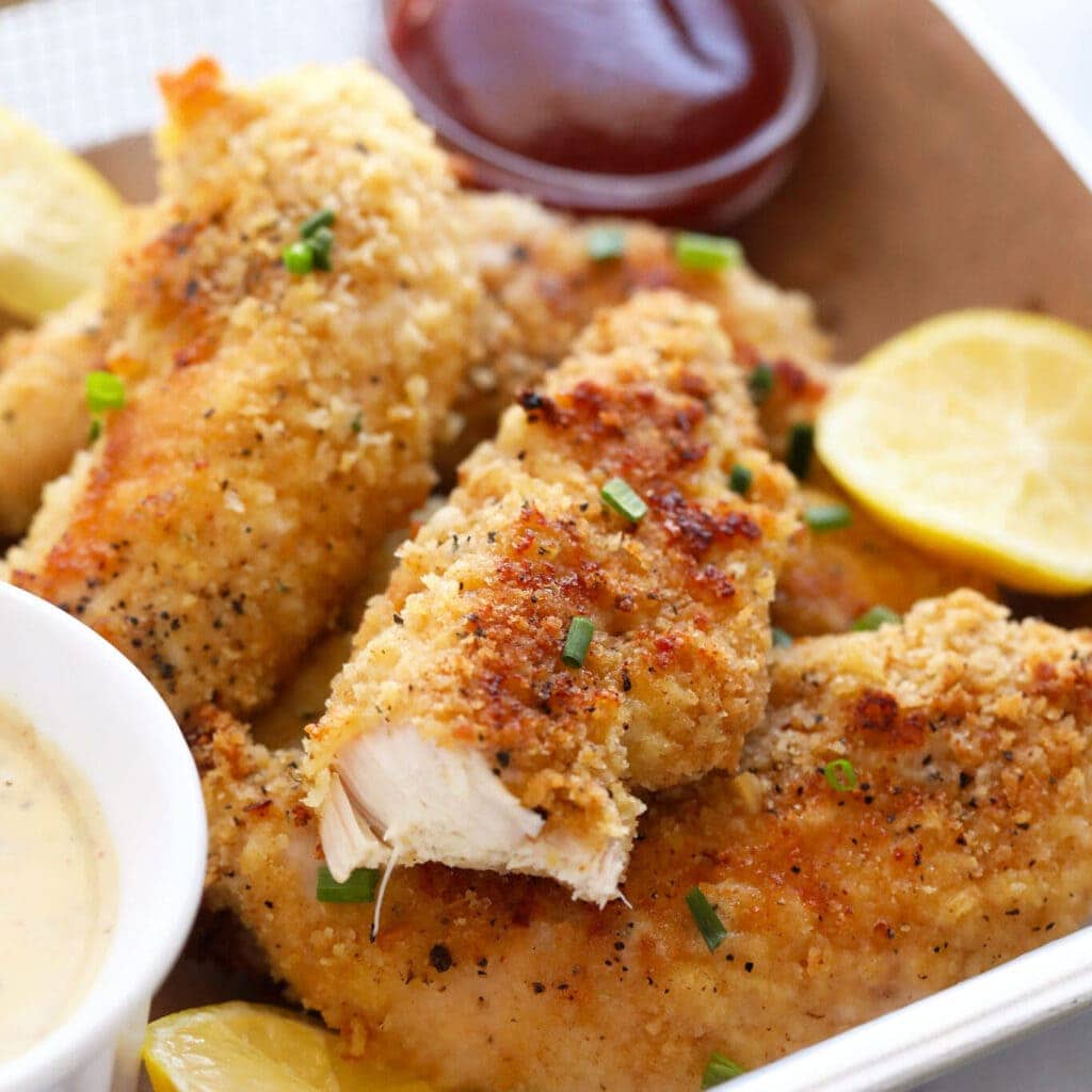 Chicken tenders in a basket.