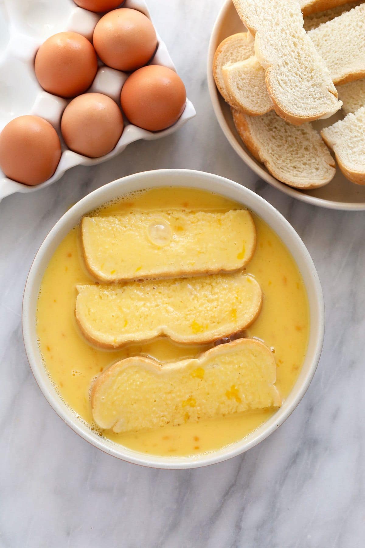 soaking French toast sticks in egg