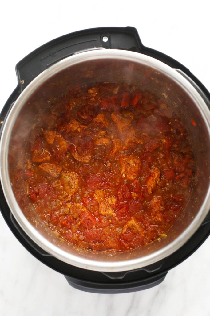 sauteed chicken and tomatoes in the instant pot for instant pot burrito bowls