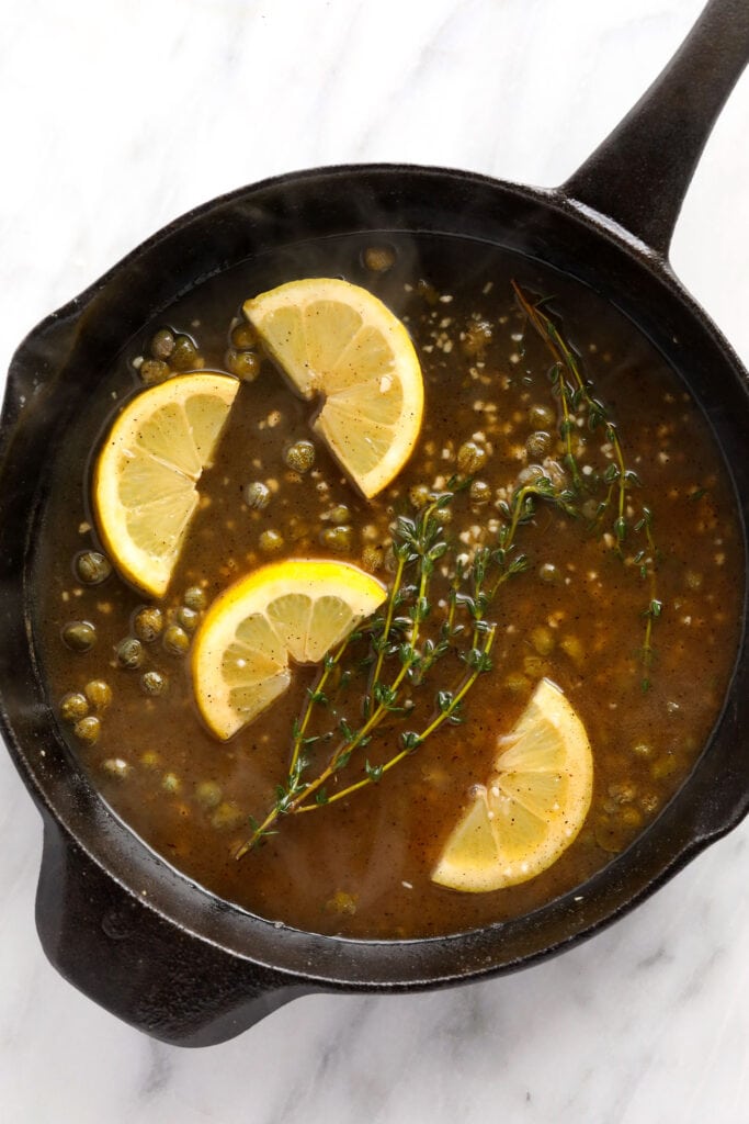 Piccata sauce with lemons, fresh thyme, and capers. 
