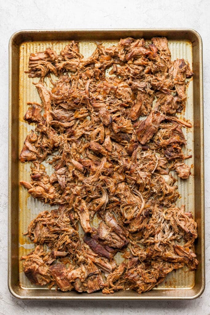 Carnitas on a baking sheet.