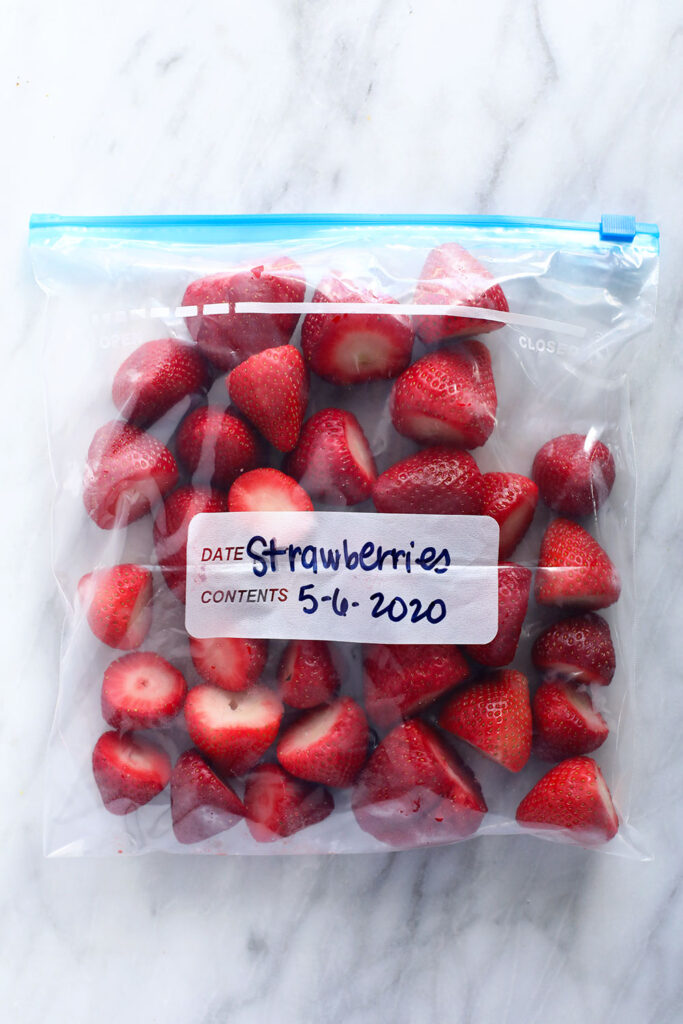 Frozen strawberries in a bag. 