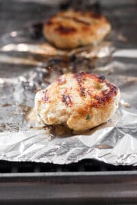 burger on grill grates.