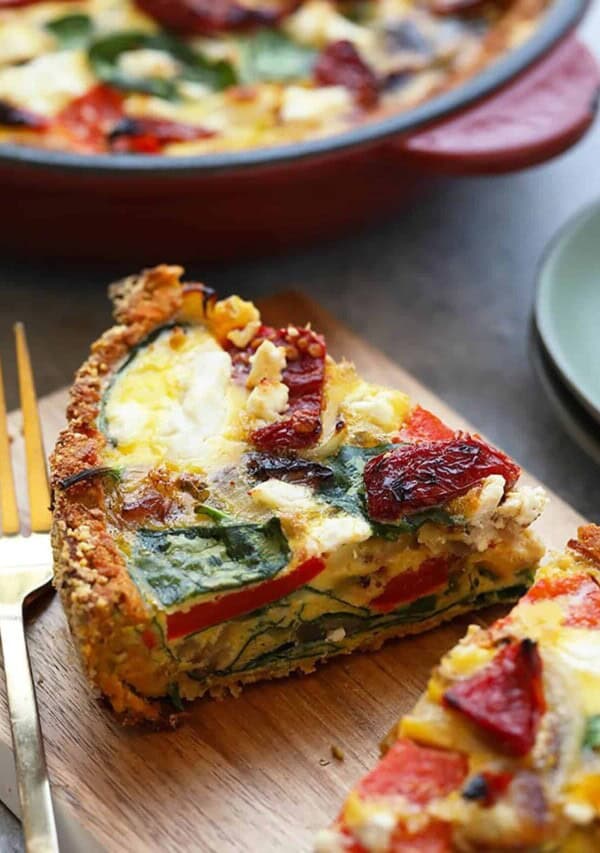 a slice of sweet potato crust quiche