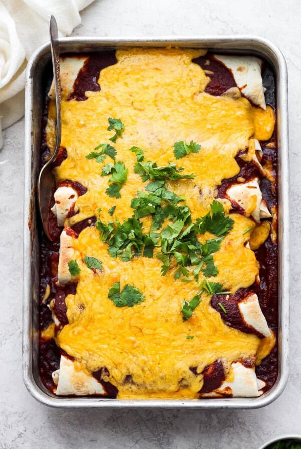 mexican enchiladas in a baking dish.