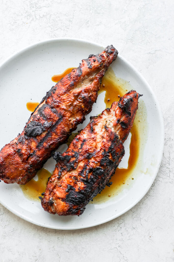 2 pork tenderloins on a plate.