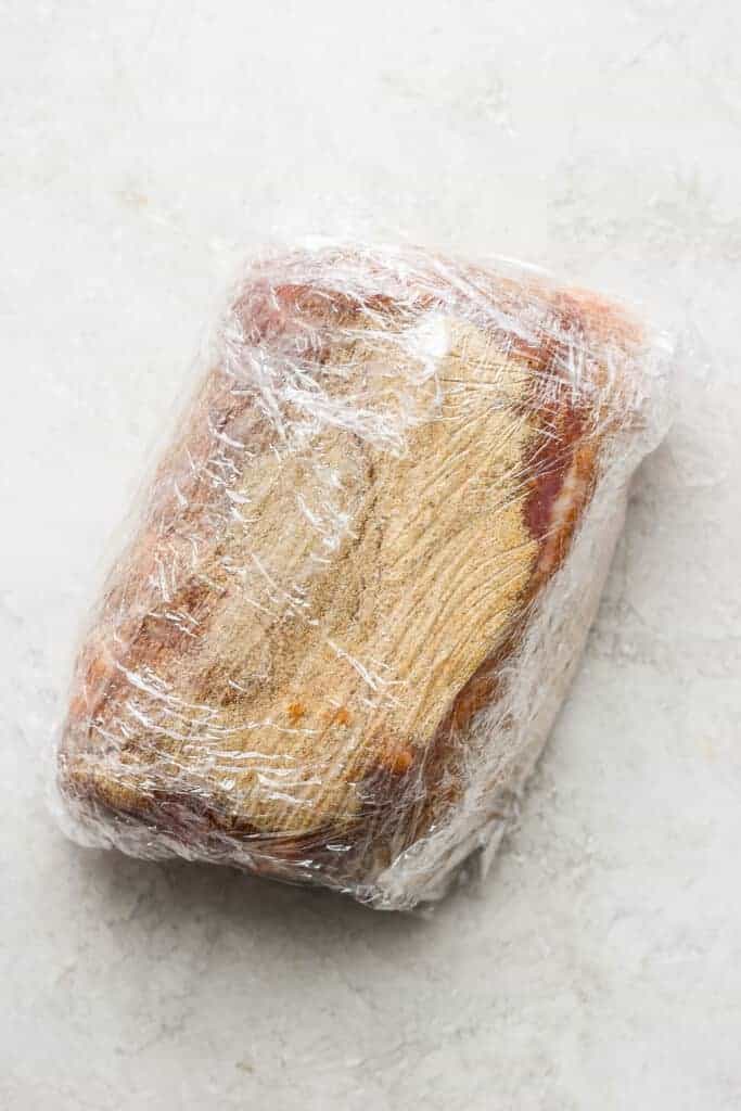 pork wrapped in plastic wrap.