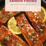 Salmon piccata in a cast iron pan.
