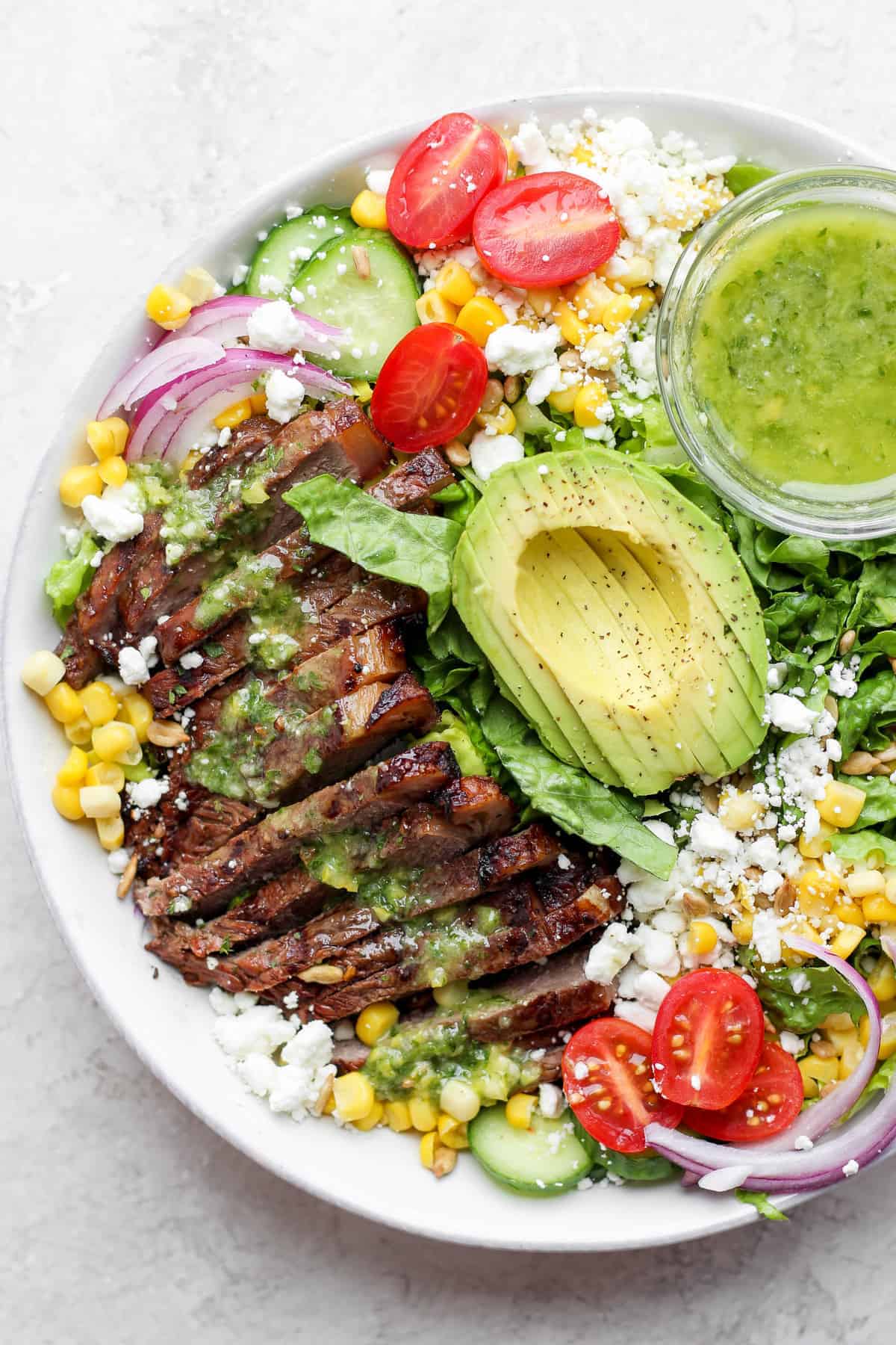 steak salad in bowl.