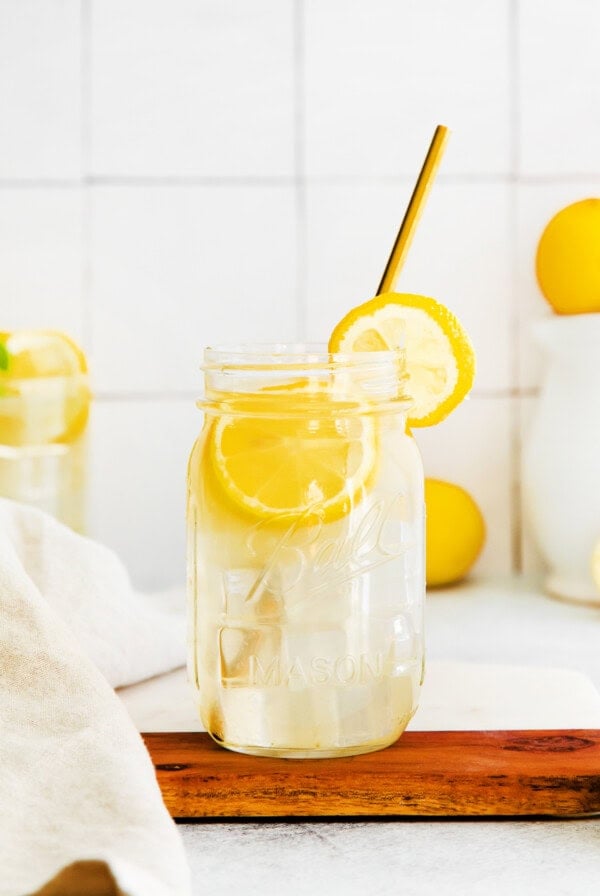 A mason jar full of homemade lemonade.
