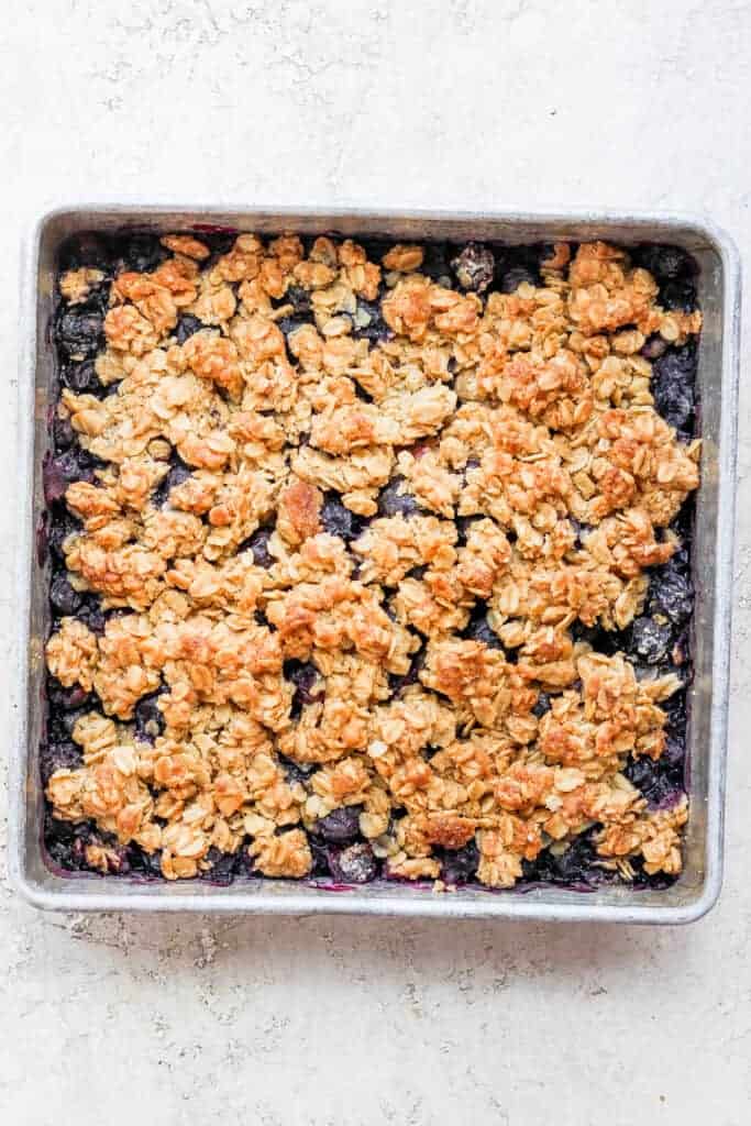 Blueberry crisp with a golden oatmeal topping. 