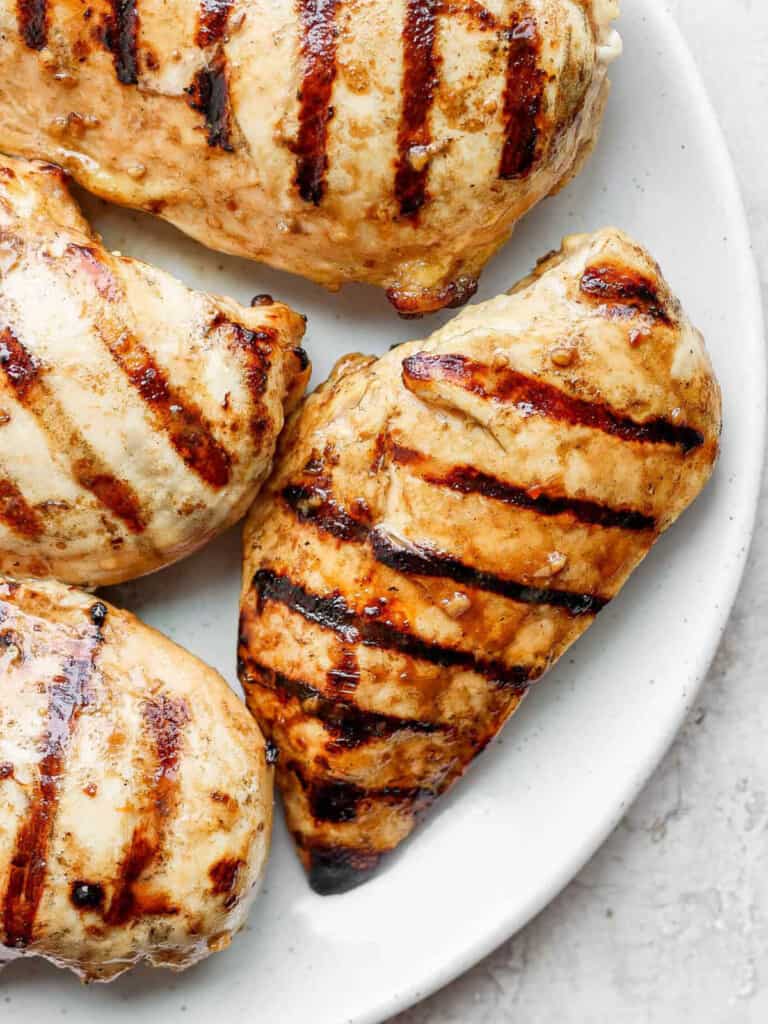 Grilling chicken shop breast on grill