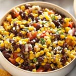 Mexican black bean corn salad with tortilla chips.