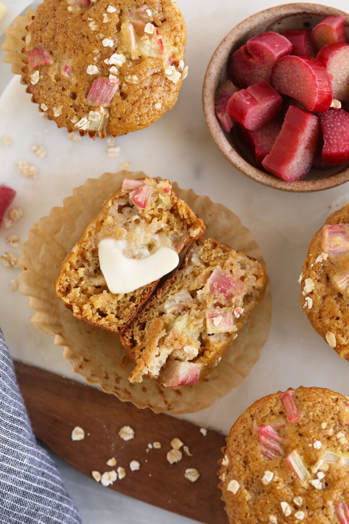 A rhubarb muffin with a pad of butter.