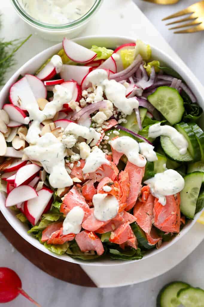 salmon salad with Greek yogurt dressing in bowl.