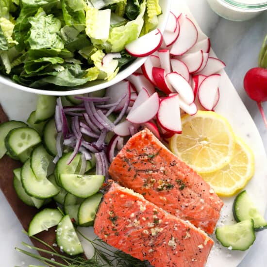 salmon salad with radishes and cucumbers.