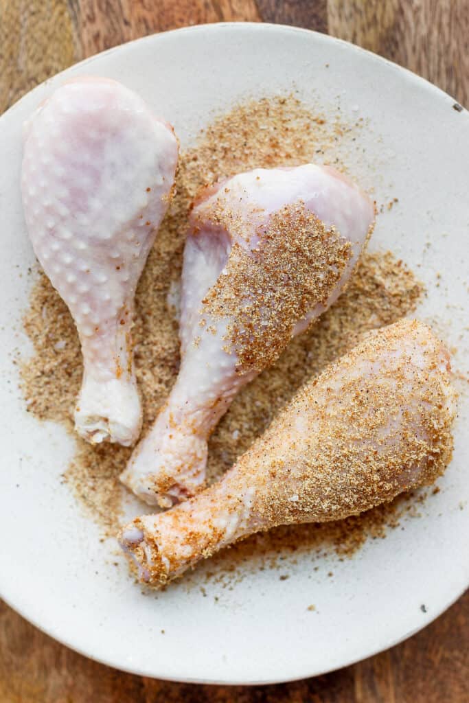 Smoked chicken legs with dry rub on them. 