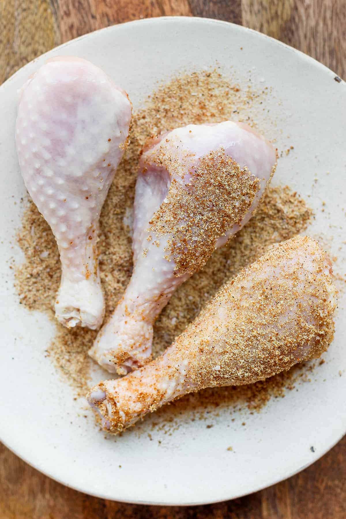 Smoked chicken legs with dry rub on them. 