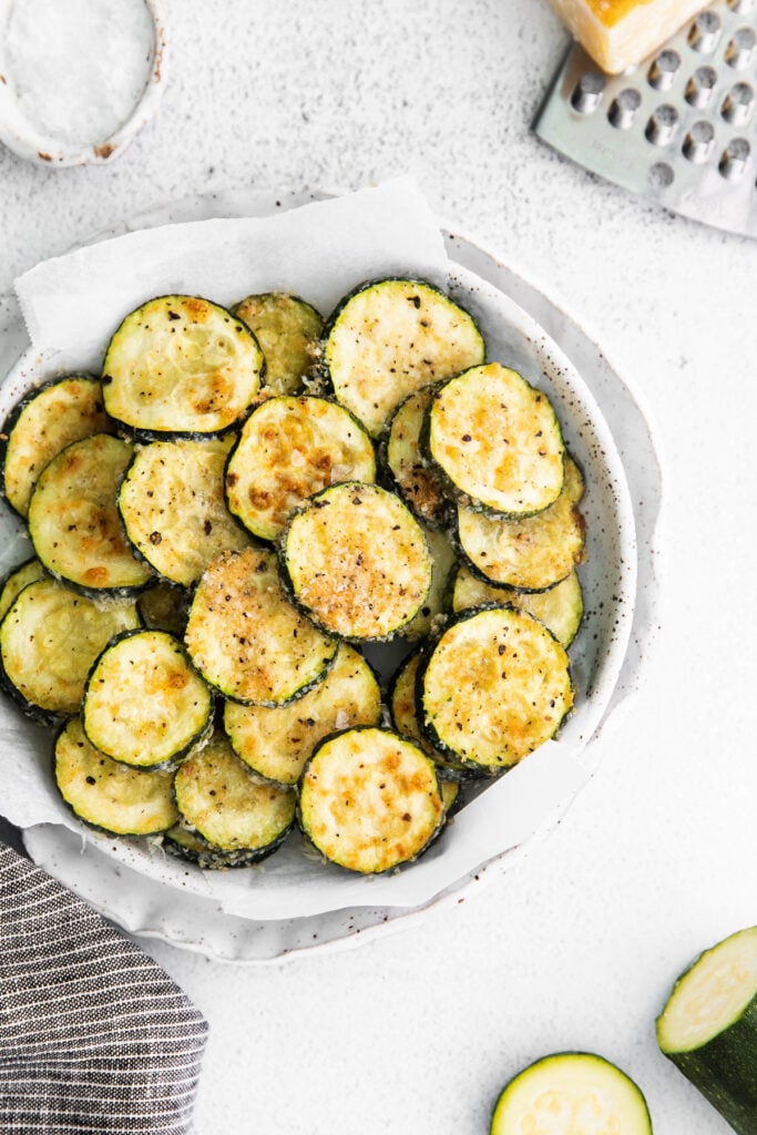 Zucchini covered in parmesan, salt, pepper, and garlic. 