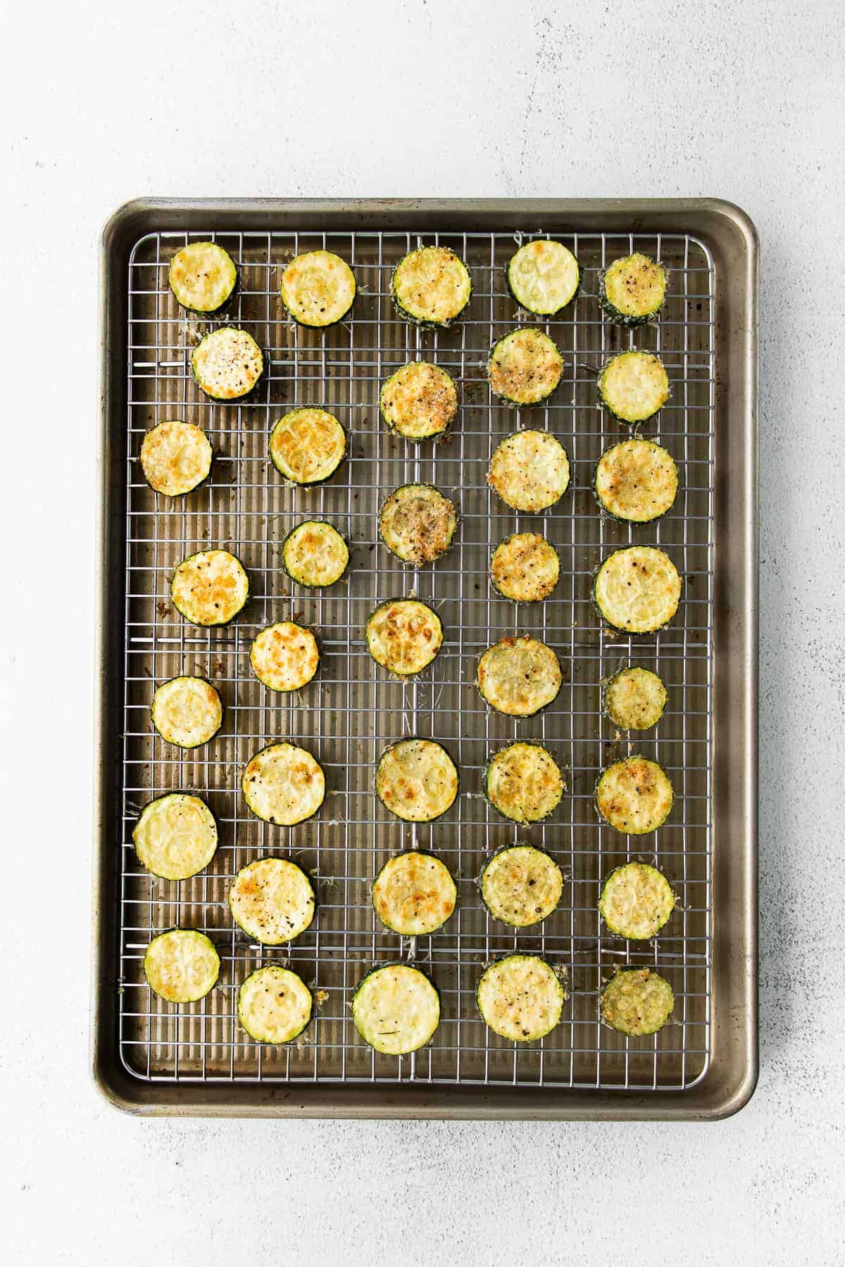 Baked Zucchini on a baking sheet. 