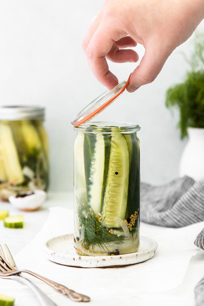 A jar full of refrigerator pickles. 