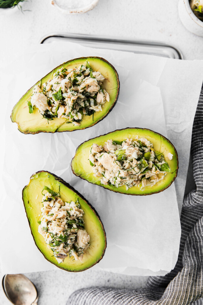 Avocado boats stuffed with fresh salmon salad. 