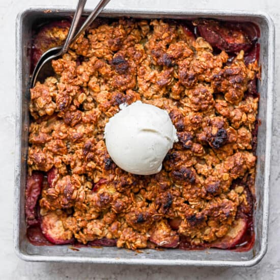 peach crisp in a square baking dish