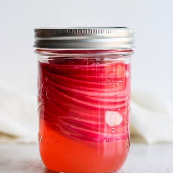 pickled onions in jar.