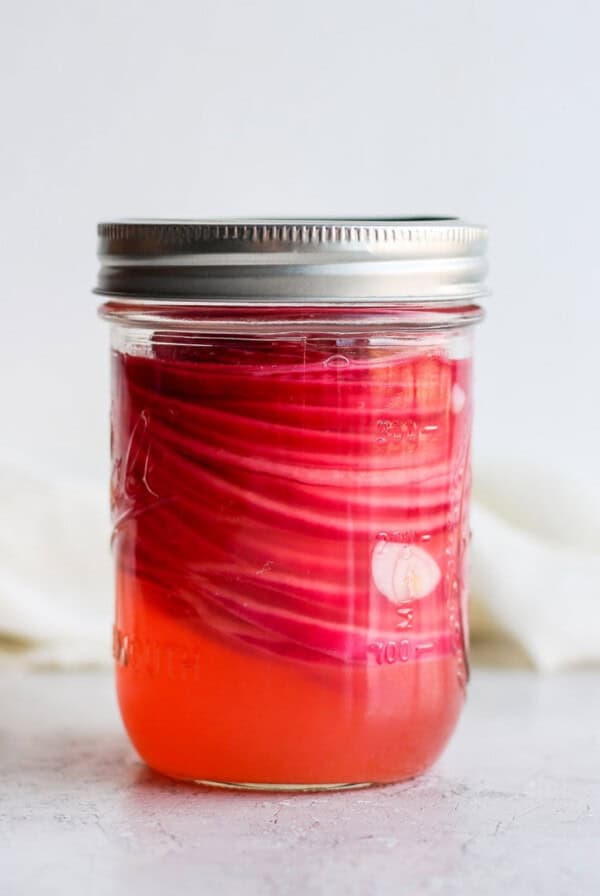 pickled onions in jar.