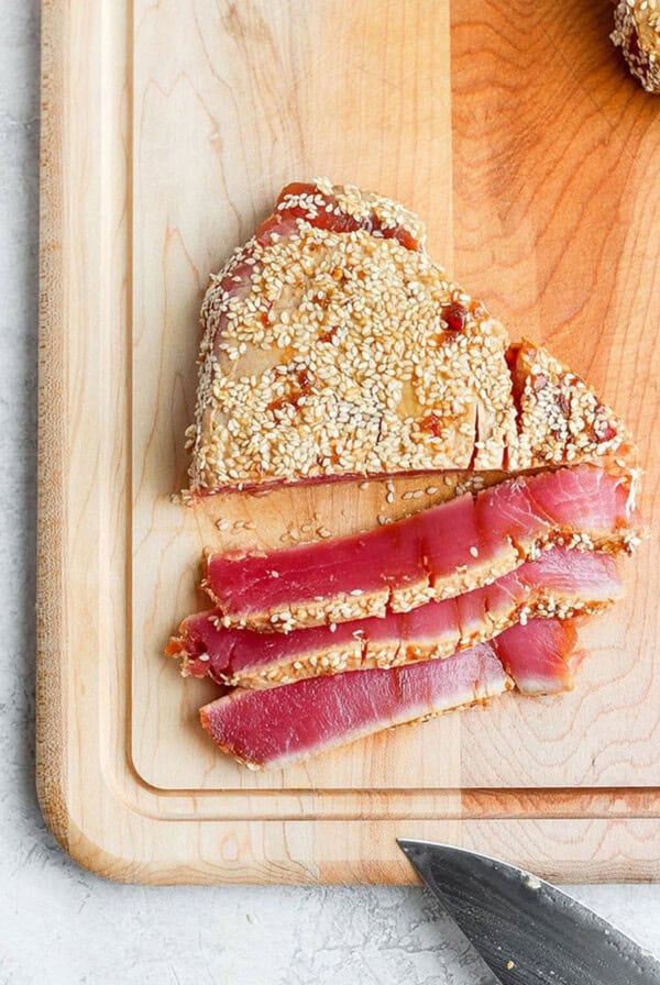 sliced ahi tuna on cutting board