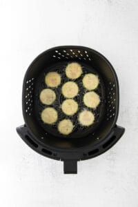 cooking zucchini coins in air fryer.