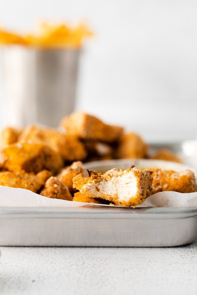 chicken nuggets in metal baking sheet