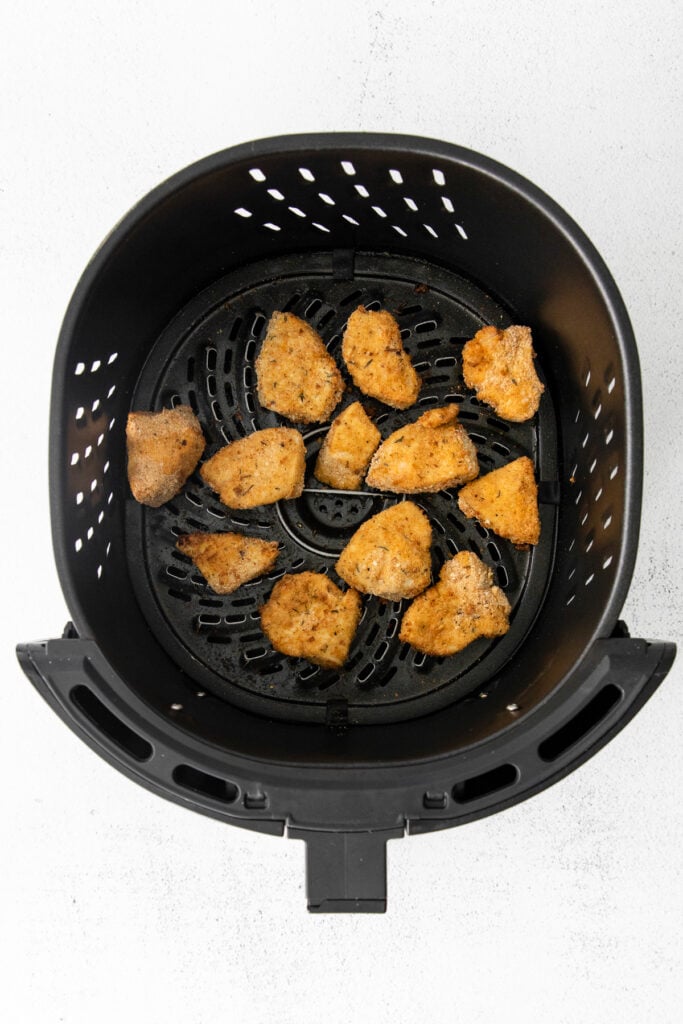 Air fryer chicken nuggets after they've been cooked. 