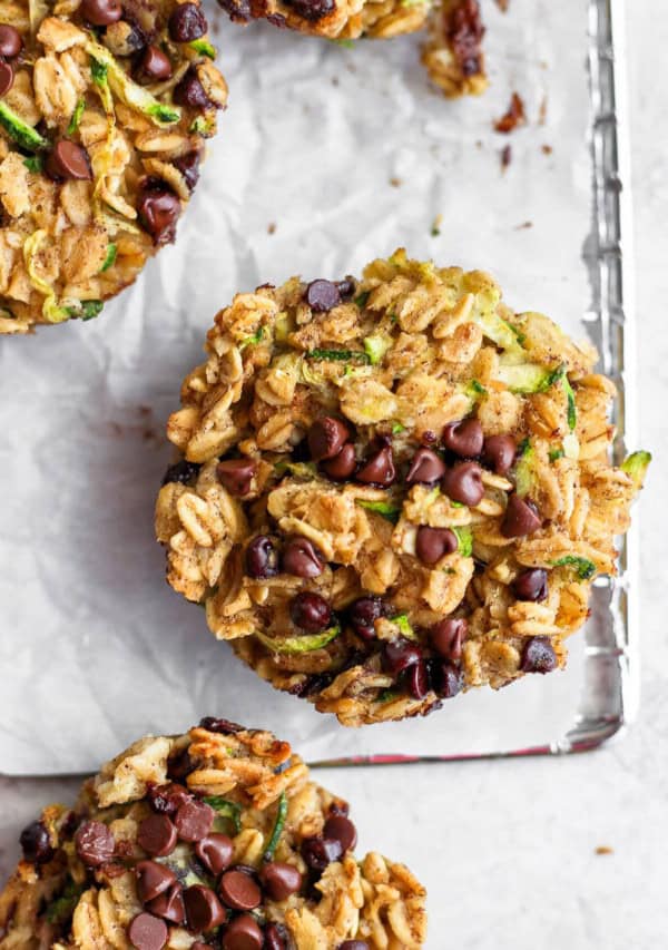 Zucchini granola muffins on a baking sheet.