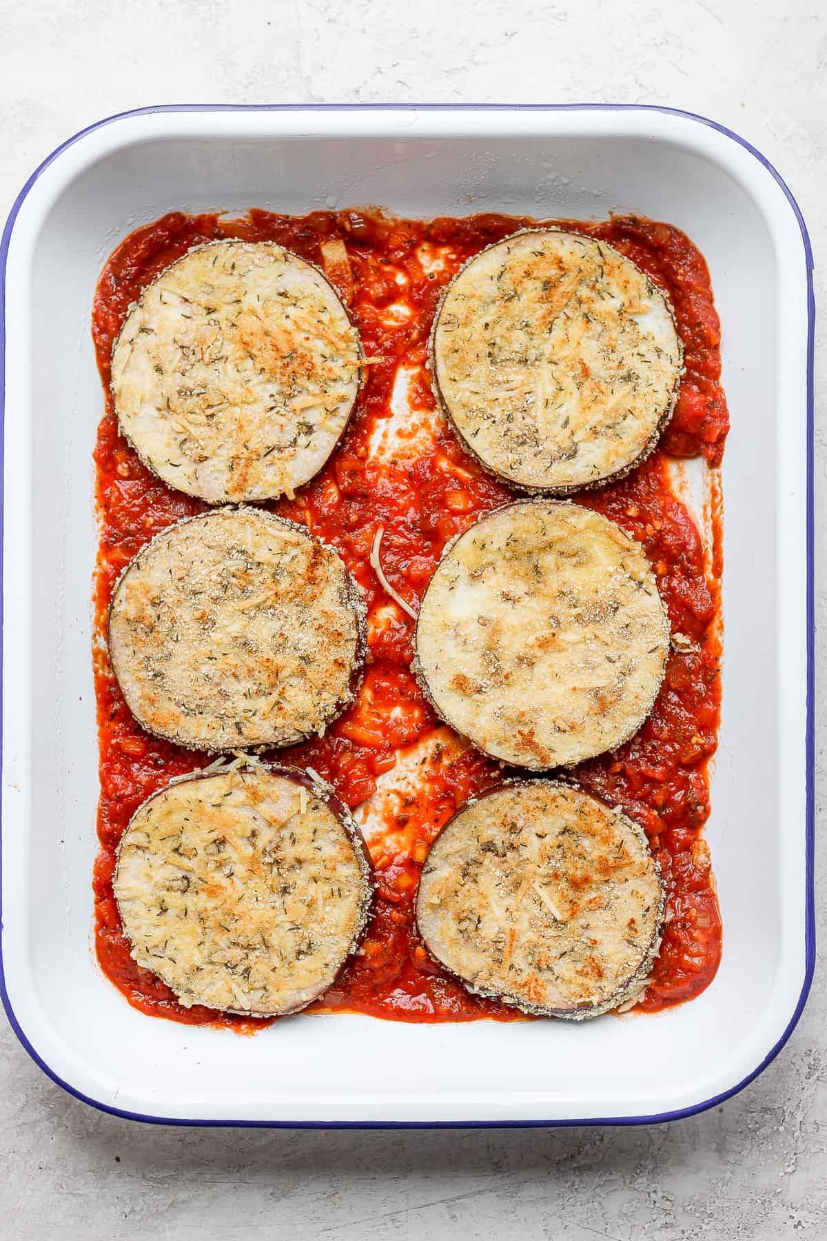 Eggplant parmesan in a baking dish. 