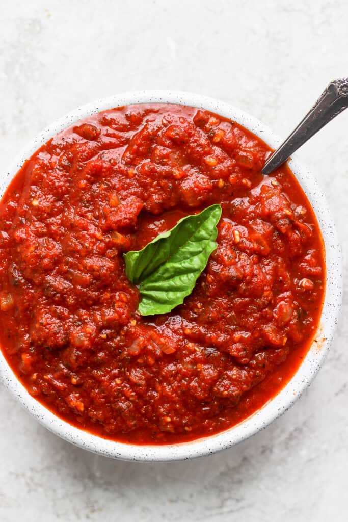 marinara sauce in bowl with spoon